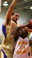 RMC's Othyus Jeffers faces up with ONU's Phil French in the Eagles' 90-74 win